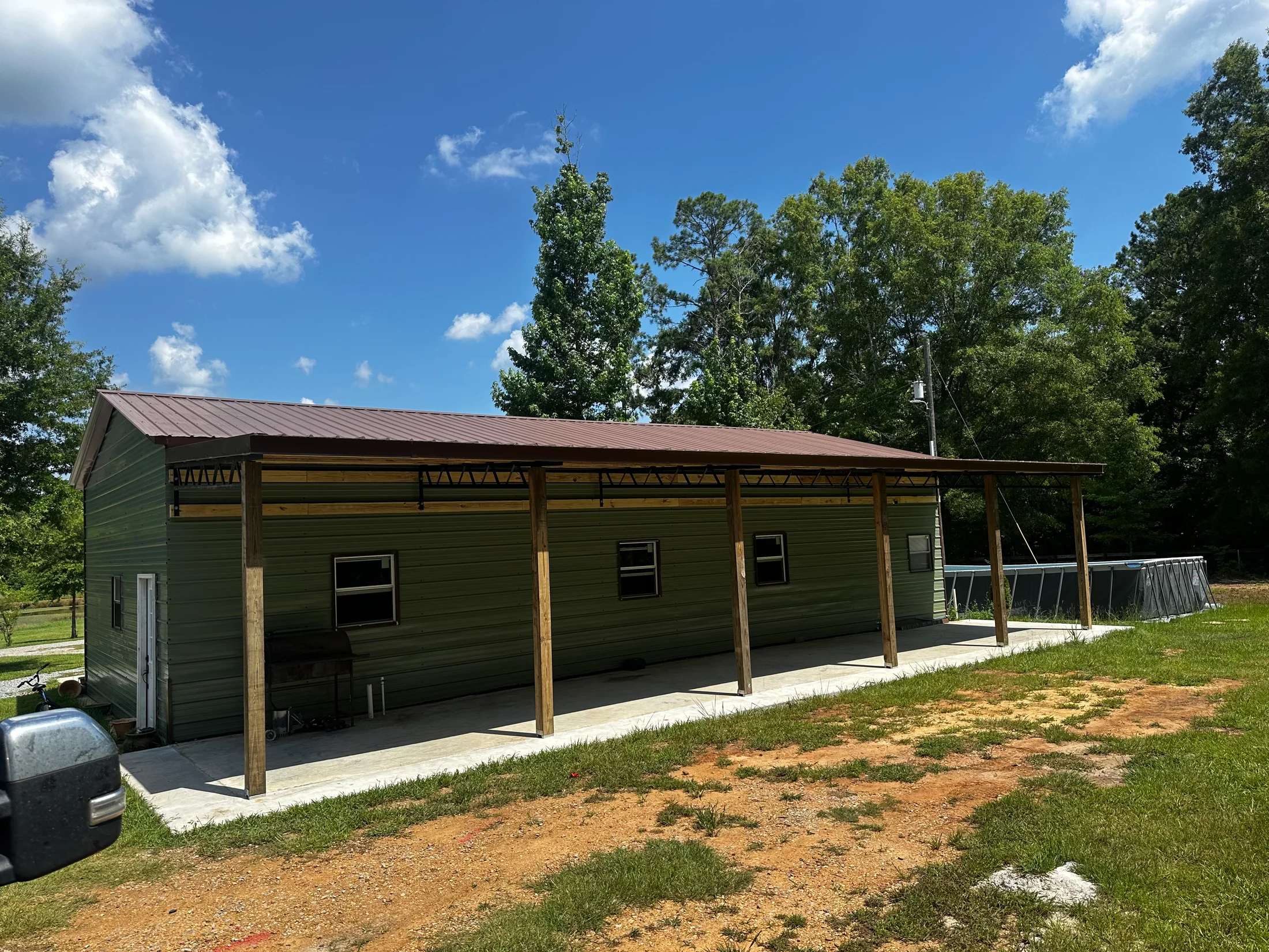 Completed metal-building lean-to addition